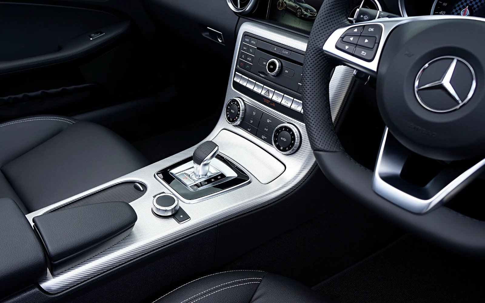 Vehicle centre console with integrated electronic controls
