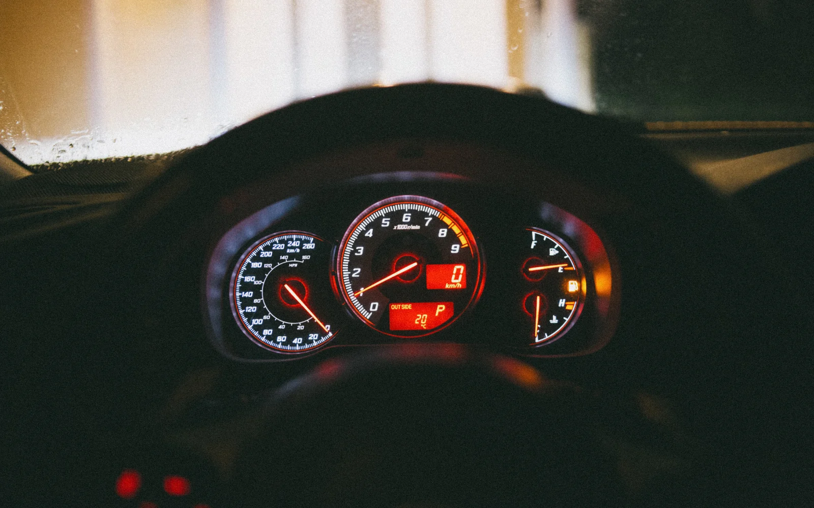 Illuminated vehicle instrument cluster