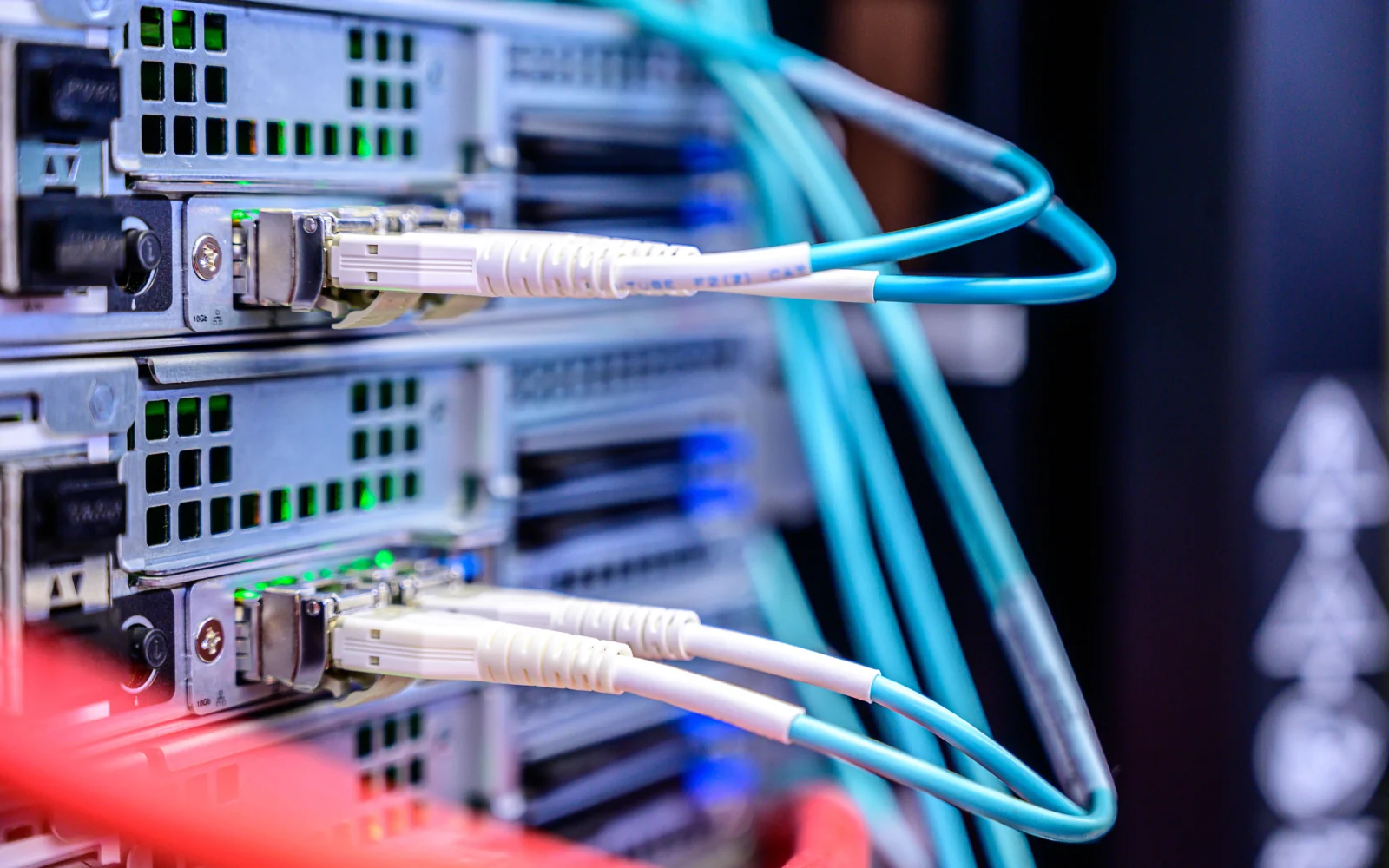 Network cables connected to rack-mounted computing equipment