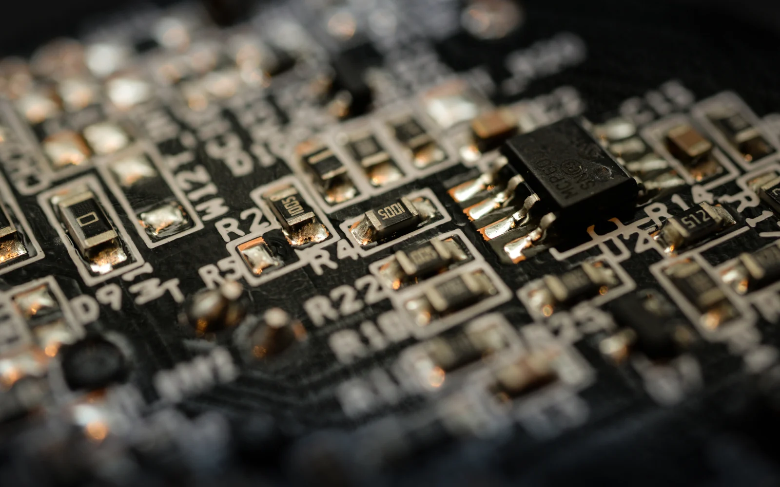 Surface-mounted integrated circuits and passive components on a circuit board