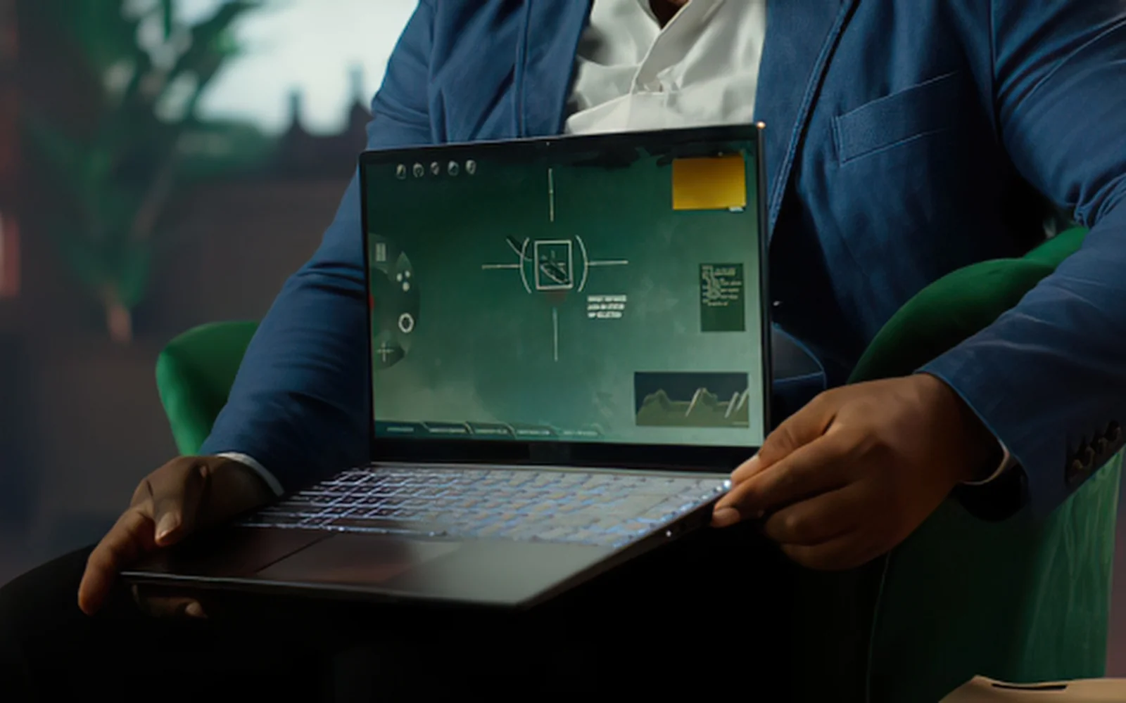 Engineer showing circuit design software on a laptop