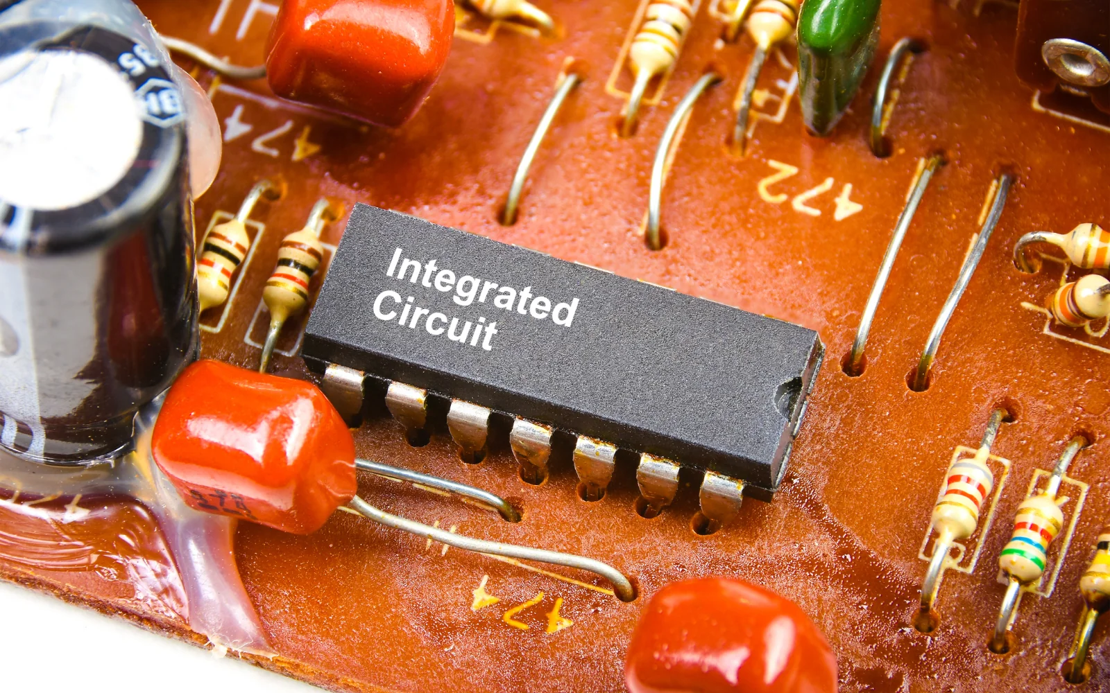 Integrated circuit on a board with resistors and capacitors