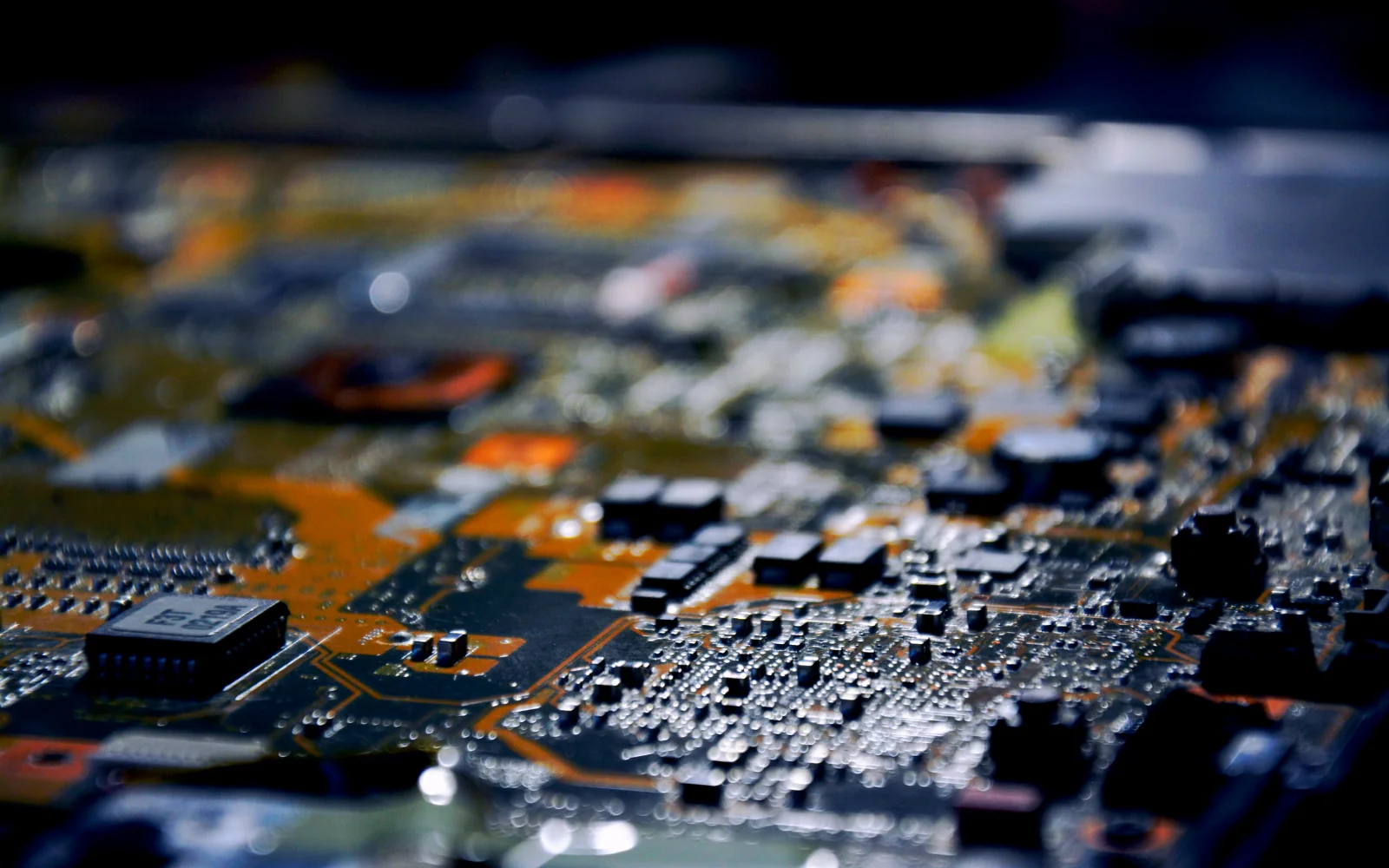 Integrated circuits and passive components on an assembled circuit board
