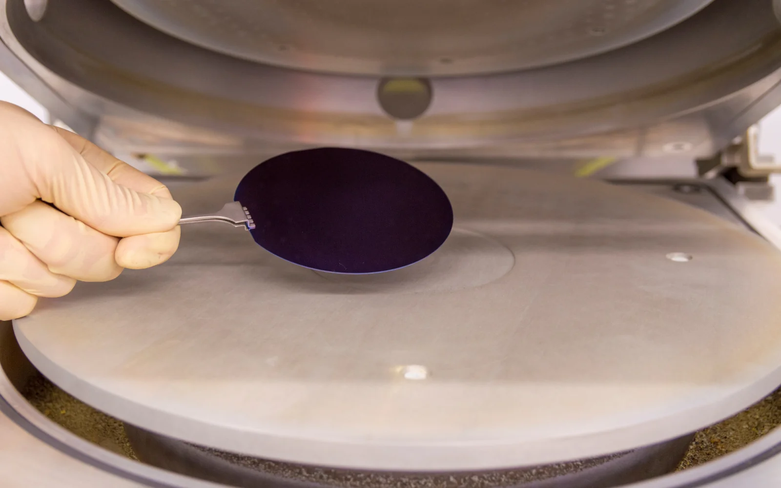 Silicon wafer held inside a deposition chamber
